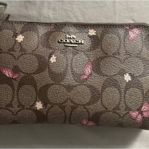 Coach Handbags - Rare Coach Butterfly Wristlet. Excellent condition. Hard to find.